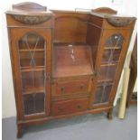 Early 20th Century oak display cabinet, the centre with fall front writing desk. (B.P. 21% + VAT)