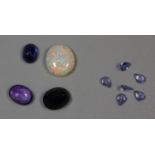 Collection of unset gemstones to include sapphire, opal, amethyst and tanzanite. (B.P. 21% + VAT)