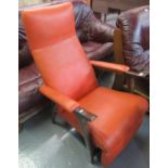20th Century G & T 'Put-U-Up' reclining armchair having orange leather finish. (B.P. 21% + VAT)
