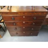 19th Century mixed woods straight front chest of four drawers with ivory escutcheons and turned