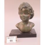 After Cipriani, patinated metal bust of a young child on a rectangular marble base. Modern. (B.P.