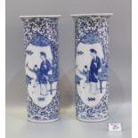 Pair of Late Qing Chinese porcelain blue and white cylinder vases, each decorated with painted