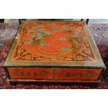Large Chinese square low centre table, overall painted with dragons amongst clouds, on a red