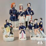 A group of four 19th Century Staffordshire pottery figures to include; Prince Albert (16cm high