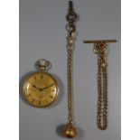 18ct gold fancy key wind fob watch having engine turned Roman face and foliate engraved back.