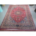 Middle Eastern design Mashad carpet of large proportions on a multi-coloured ground decorated with