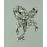 A Victorian diamond spray brooch depicting a tulip flower and bud. Approx 40 x 23mm. Approx weight