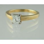 A princess cut diamond ring set in 18ct gold. Estimated diamond weight 0.40cts. Ring size J.