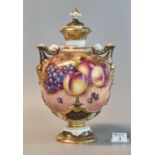 Royal Worcester 1970's porcelain two handled pedestal vase and cover of baluster form, painted and