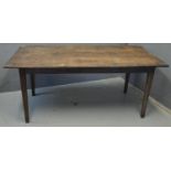 West African colonial hardwood dining table with three plank top, having incised decoration and