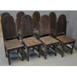 Set of eight West African colonial style dining chairs with arch panelled backs, solid seats and