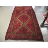 Red ground geometric Persian Nahavan village rug. 149 x 283cm approx. (B.P. 21% + VAT)