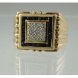 9ct gold ring set with black and white diamonds. Ring size S. Approx weight 7 grams. (B.P. 21% +