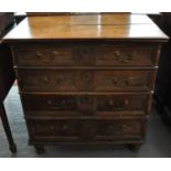 17th Century oak Jacobean straight front chest of four long drawers with later brass swan neck