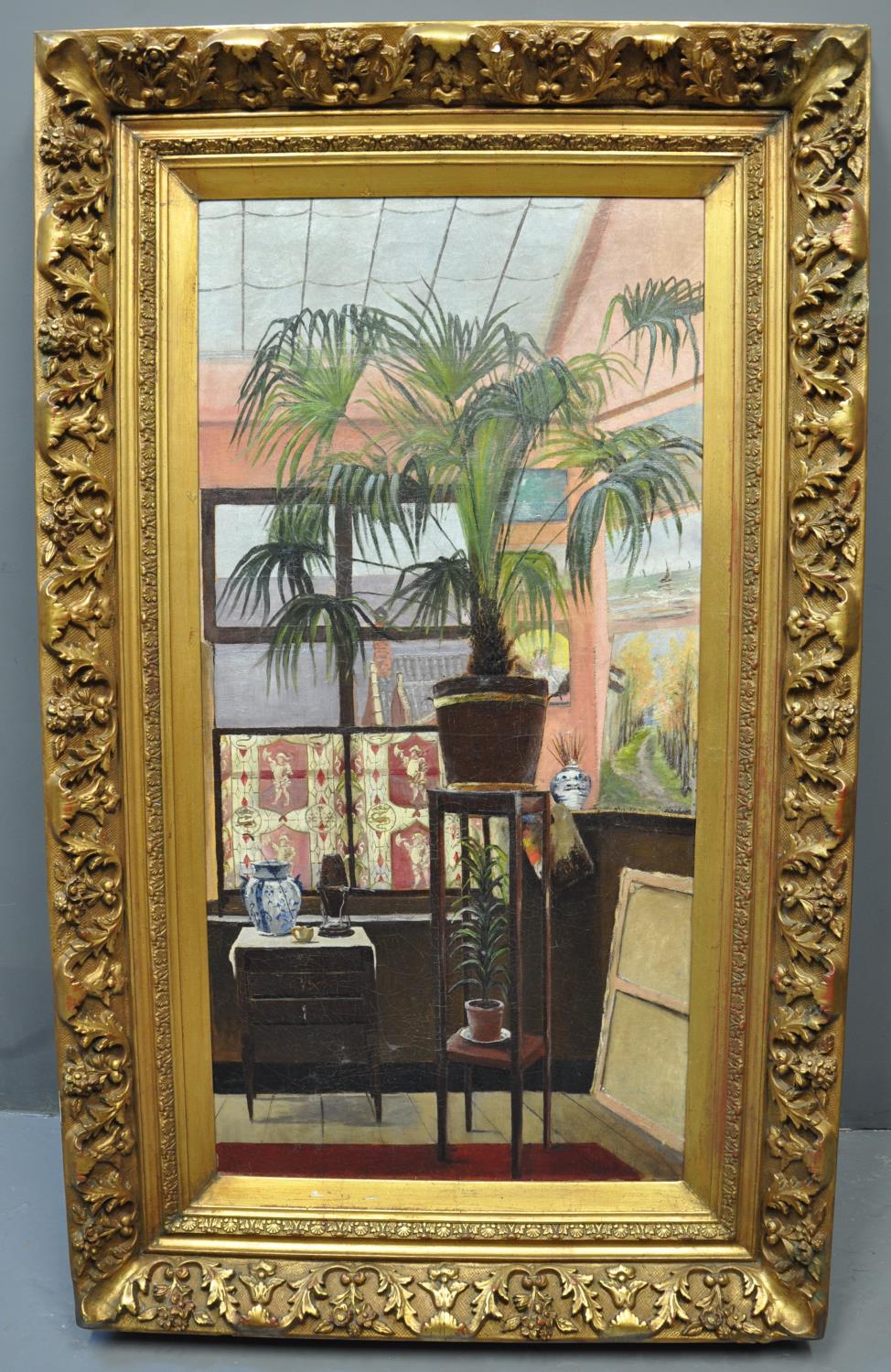 British school (19th Century), an artist's studio with potted plant, the windows looking out to sea,