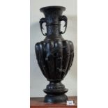 Large Japanese patinated bronze fluted baluster shaped vase with extended neck having elephant
