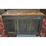 18th century oak coffer, the hinged moulded top above three panels of plain form, standing on