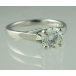 A diamond solitaire ring set in platinum. The brilliant cut diamond an estimated 1.02cts. Ring