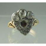 A Georgian diamond crowned heart ring set in 18ct gold with engraved shoulders. Ring size O.