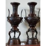 Pair of Japanese Meiji period patinated chestnut coloured bronze two handled baluster shaped