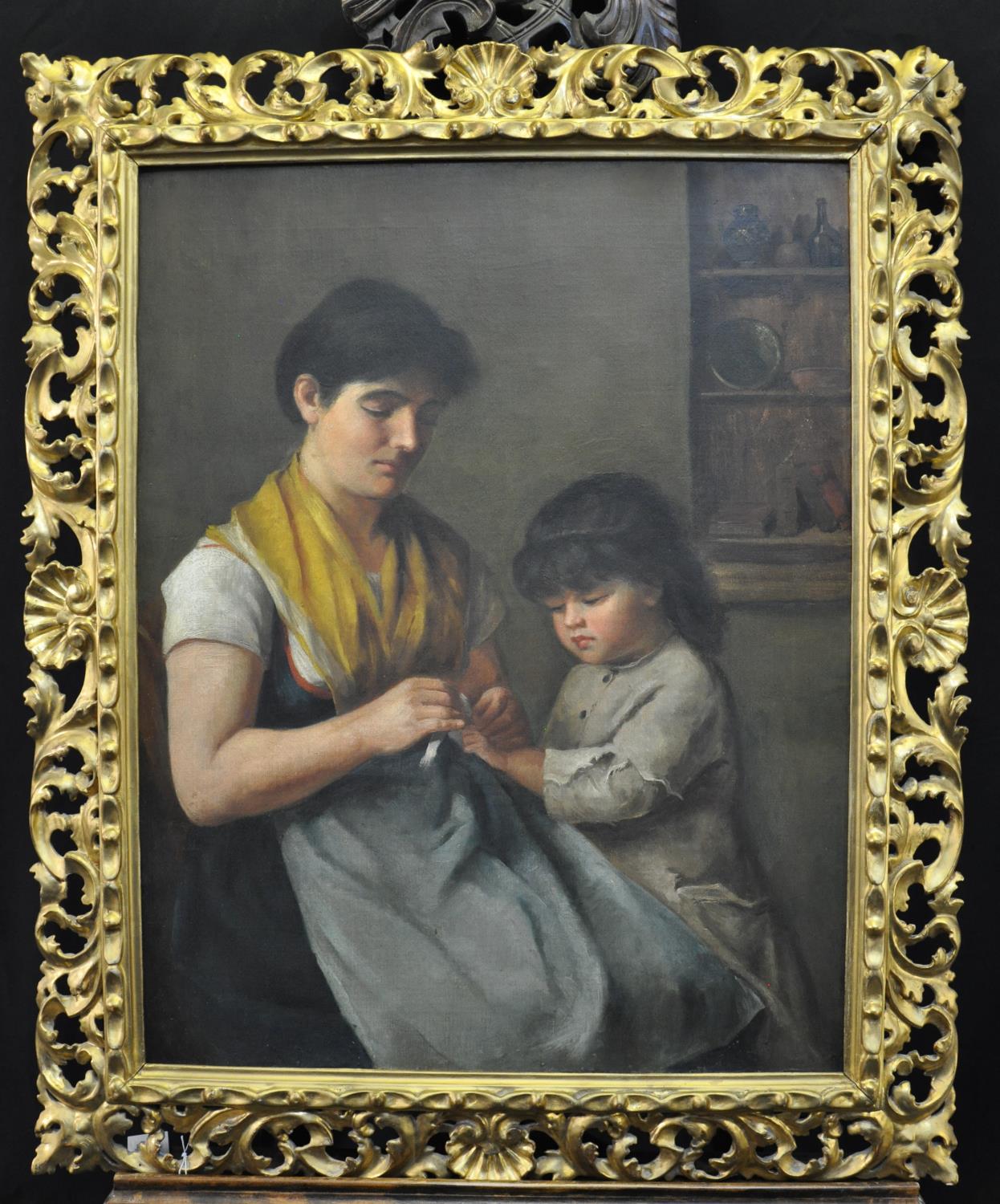 Continental school (late 19th/early 20th Century), portrait of a mother and child, oils on canvas.