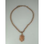 9ct rose gold double Albert chain with 9ct gold shield shape fob. Length 17 inches (43cm). Approx
