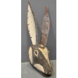 West African polychrome decorated carved wooden hare or rabbit mask. 66cm high approx. Bobo