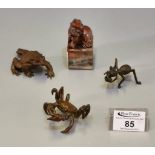 A collection of Japanese bronze miniature animals to include; toad, ant and crab, crab and toad with