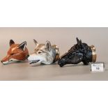 Three Royale Stratford Staffordshire novelty porcelain stirrup cups in the form of a fox, a wolf and