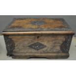 Plain West African wooden trunk with applied repousse white metal decoration, probably Ghanaian.