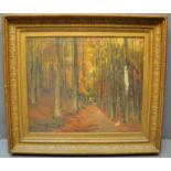 Sam Garratt (Welsh, Brecon, early 20th Century), an autumnal woodland walk, signed, oils on