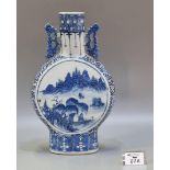 Chinese Late Qing porcelain high footed blue and white Moon flask, painted with cartouches of