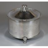 Arts and Crafts design beaten silver circular box and cover with rope twist decoration on three hoof