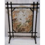Late 19th Century Aesthetic Movement glass firescreen the frame ebonised and gilded in bamboo style,