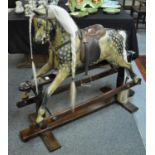 Early 20th Century dapple grey rocking horse, 'Hercules', possibly by Stephensons or Lynes, on