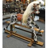 Good modern dapple grey rocking horse on patent swing stand with natural horse hail long mane and