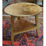 19th century pine cricket table with shaped frieze and triangular under-tier. 70cm diameter & 72cm