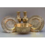 A group of assorted Chinese polished yellow metal (probably bronze) items to include; two plates,