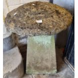 A pair of mushroom shaped staddle stones, the bases later cement or concrete. 60cm high approx. (