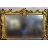 19th Century carved gilt wood rectangular over mantel mirror with foliate C scroll mouldings