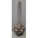 Large West African Kora multi-stringed instrument with metal studded body and 16 adjustable tuning