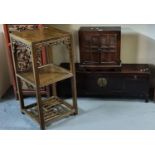 Three items of Chinese furniture to include; small table top cabinet with pierced doors, a