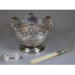 Late Victorian silver Monteith of small proportions having relief organic and fluted decoration on a