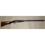 William Ford 12 bore double barrelled box lock ejector shotgun, 29.5" barrels, scroll engraved