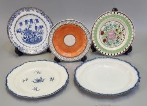 A group of Welsh pottery plates to include; a orange ground hand painted dish with indented rim