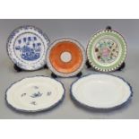 A group of Welsh pottery plates to include; a orange ground hand painted dish with indented rim