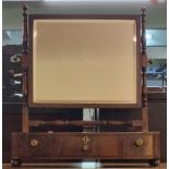 19th Century mahogany bow front bevel plate bedroom or toilet swivel mirror, having turned