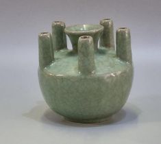 Chinese Guan style crackle green glazed stick neck baluster vase with five specimen stems around a