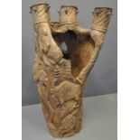 West African carved Unity drum from a single multi-stemmed trunk, overall carved with figures, lions