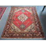 Middle Eastern design Lilian rug on a multi-coloured ground, the central medallion on a pink